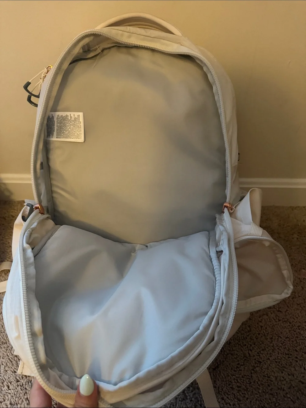 The North Face Surge Lux Backpack in Cream with Rose Gold(good as new 90%)